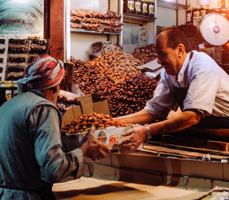 man-in-blue-top-giving-box-to-man-in-gray-top-696205 man-in-blue-top-giving-box-to-man-in-gray-top-696205